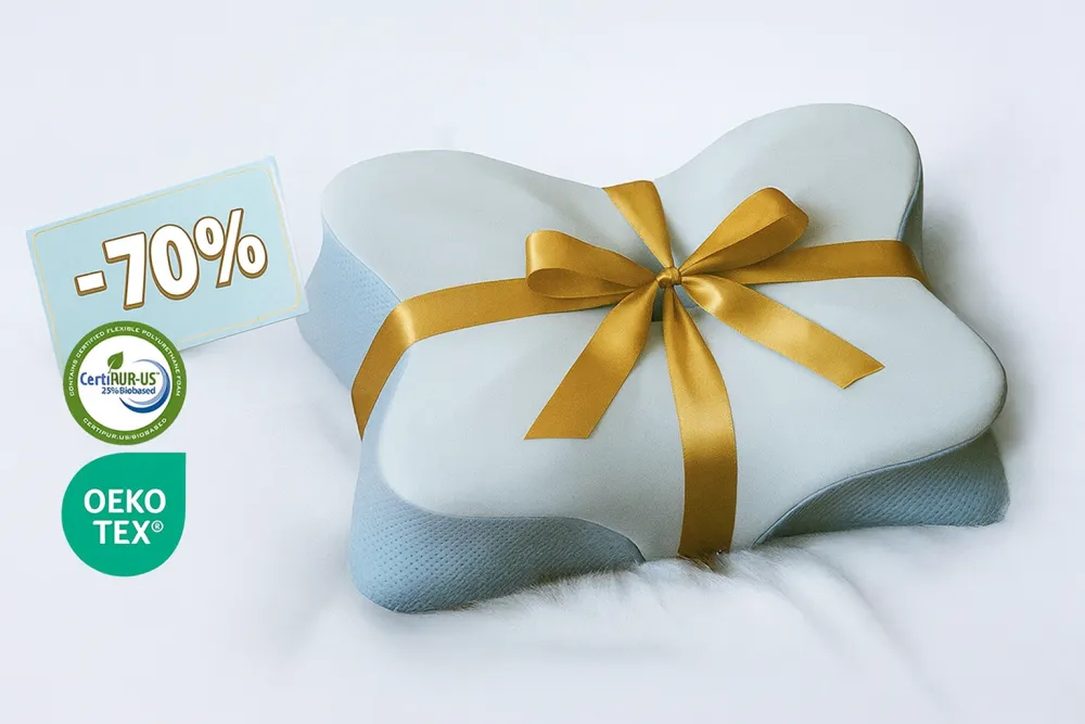 Derila Ergo pillow with a gift ribbon